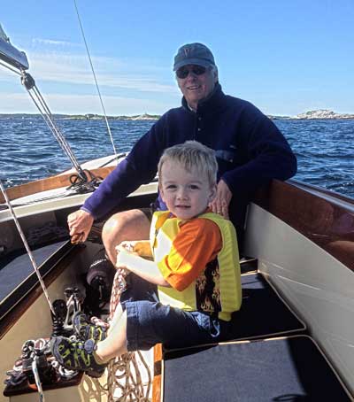 Gary Jobson sailing with his grandson, Declan.